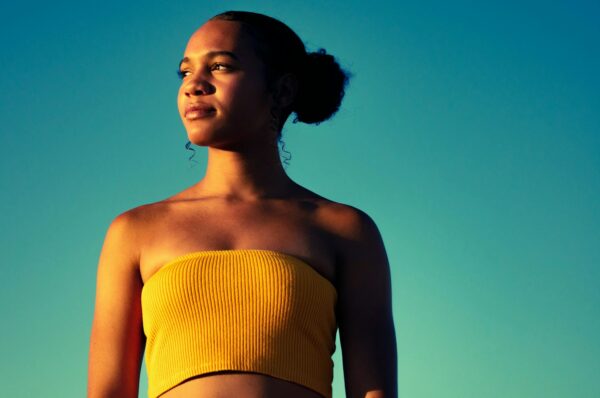 woman wearing yellow tube top